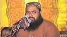 عکس ثابت از یک ویدئو از قاری یاسین در حین سخنرانی در یک مراسم در چند سال پیش.