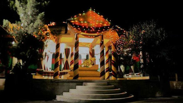 The tomb of King Amanullah Khan, who secured Afghanistan's independence in 1919, is lit up and adorned with the colours of the Afghan flag in Nangarhar Province. [Salaam Times]