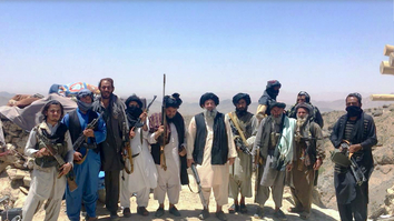 Taliban fighters loyal to Mullah Mohammad Rasool, including Mullah Manan Niazi (centre), are shown in Adraskan District, Herat Province, May 15, in a screen shot from Salaam Times' video.