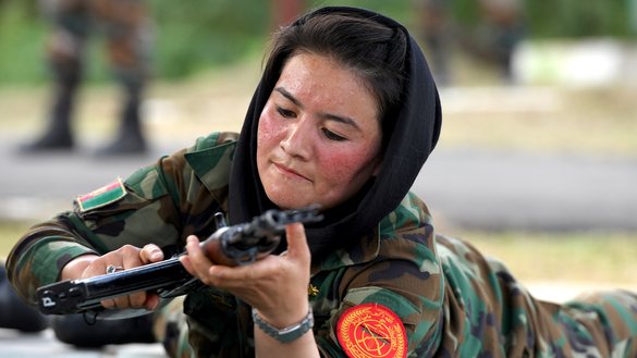 An Afghan army cadet prepares to fire at a target during a practice session at the Officers Training Academy in Chennai on December 12. [Arun SANKAR / AFP]