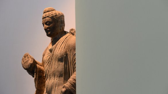 A Buddha statue that was found in Sarai Khowja, 33km north of Kabul, in 1965 and dating back to the 2nd-4rd century CE is exhibited in the Kabul Museum October 13, 2012. [Jawad Jalali/AFP]