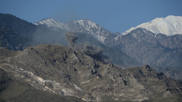 Smoke rises from an air strike on "Islamic State of Iraq and the Levant" (ISIL) positions in Achin District, Nangarhar Province, April 14, a day after the US military dropped its largest non-nuclear bomb on the district. [Noorullah Shirzada/AFP]