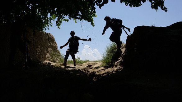 Afghan troops patrol during an anti-ISIS operation in Chaparhar District, Nangarhar Province, May 21. Chaparhar is free of ISIS now, said military officials June 16. Afghan troops are moving on to Tora Bora. [Noorullah Shirzada/AFP]