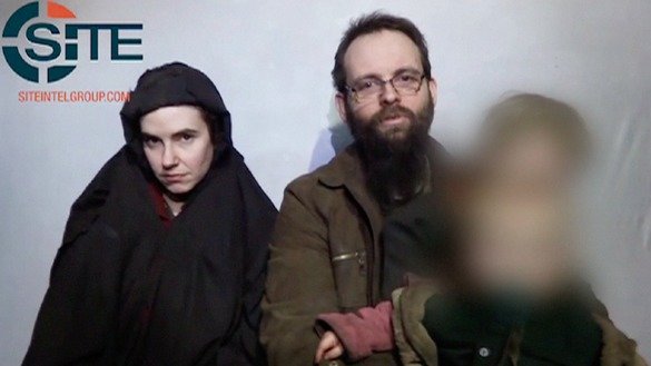 A still from a video released by militants last year, picturing Caitlan Coleman, Joshua Boyle and their son. [-- / SITE INTELLIGENCE GROUP / AFP]
