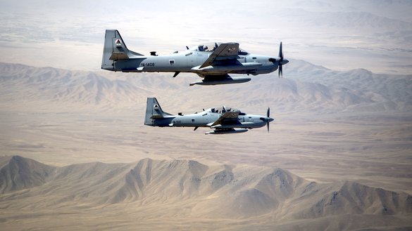 AAF A-29 Super Tucanos fly a two-ship formation over Kabul August 14, 2015. [Staff Sgt. Larry E. Reid Jr./US Air Force]