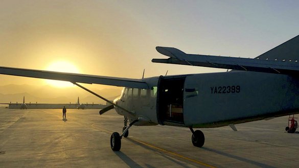 An Afghan Air Force (AAF) C-208 prepares for take-off after being loaded with almost 1,000 lbs. of ammunition for AAF's first emergency airdrop June 1 at Kabul Air Wing. [Capt. Brian Barnette/NATO]