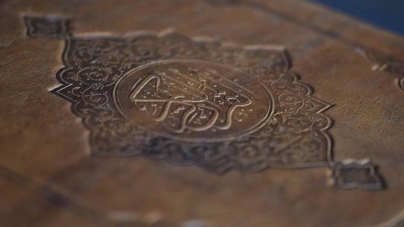 The silk Koran is bound in goat leather and stored in a hand-carved walnut box to protect it from the elements. [Turquoise Mountain/Facebook]