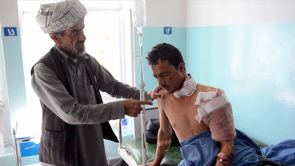 This screenshot taken from an AFPTV video shows an injured man receiving medical treatment in Ghazni Provincial Hospital August 12. [MOHAMMAD ANWAR DANISHYAR/AFPTV/AFP]