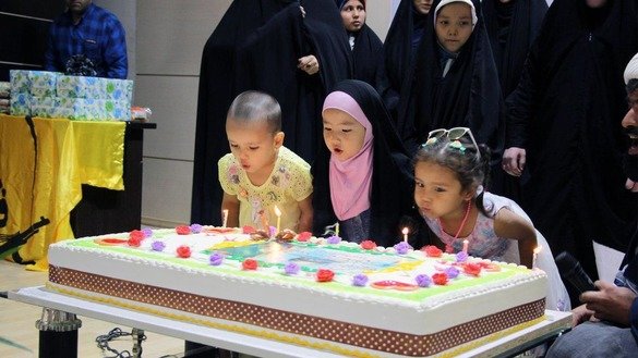Pro-Fatemiyoun groups host an event on August 31 in Mashhad, Iran, celebrating the July birthdays of several children who have lost their fathers in the war in Syria. [File]