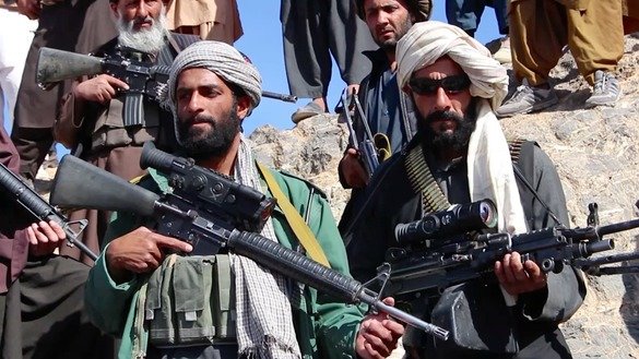 A screenshot from a video shows Taliban fighters under Mullah Manan Niazi, deputy commander of a Taliban splinter group, in an undisclosed location in Herat Province November 10.
