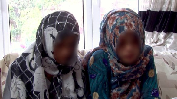 A video screenshot shows two sisters who were gang raped by Taliban militants in their home on May 6 in Qaramaqol District.