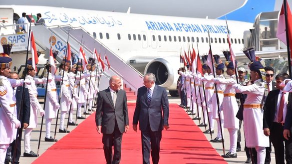 President Ashraf Ghani (left) is received by an honour guard on his arrival in Islamabad June 27. [Pakistani Press Information Department]
