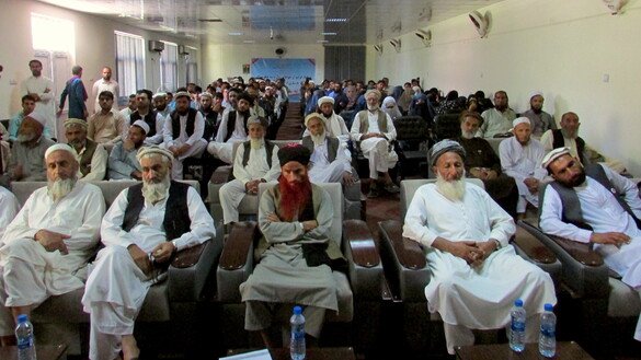 More than 100 residents of Nangarhar Province gather August 22 to urge the Taliban to negotiate in good faith for ongoing peace talks. [Khalid Zerai]