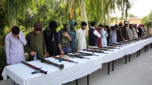 Twenty Taliban militants along with three members of "Islamic State of Iraq and Syria"'s Khorasan branch (ISIS-K) surrender to local authorities August 28 at the compound of the National Directorate of Security (NDS) office in Jalalabad, Nangarhar Province. [Provincial governor's press office]