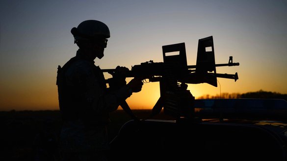 In this picture taken on October 13, an Afghan National Defence and Security Forces (ANDSF) soldier patrols an area in Guzara District, Herat Province. [Hoshang Hashimi/AFP] 