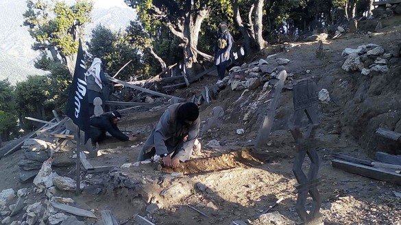 Members of ISIS try to improve their makeshift camp in Kunar province in this photo published on Telegram last November. [File]