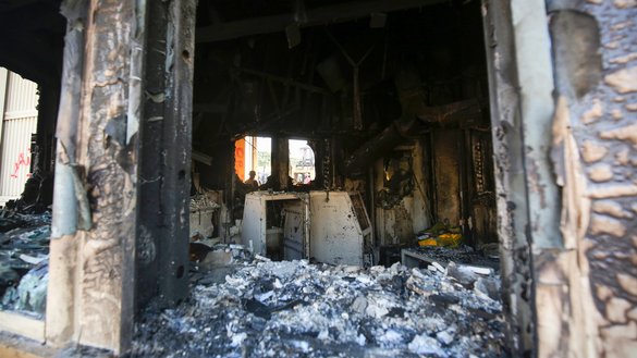A picture shows the entrance leading to the US embassy in the capital Baghdad on January 2, 2020, which was damaged the day before by Iran-backed Iraqi militia members. [Ahmad al-Rubaye/AFP]