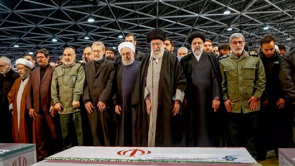 Brig. Gen. Esmail Qaani (in military uniform on right) is seen here with Iran's Supreme Leader Ali Khamenei, President Hassan Rouhani, and other top officials on February 6 in Tehran in front of the coffin of Qasem Soleimani, the former head of the IRGC's Quds Force. [Iranian Ministry of Defence]