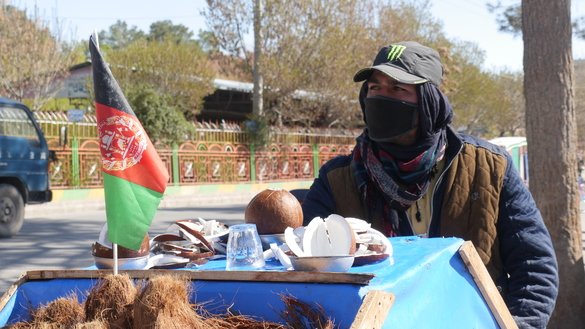 A juice maker wears a mask in Herat city on March 8. [Omar]