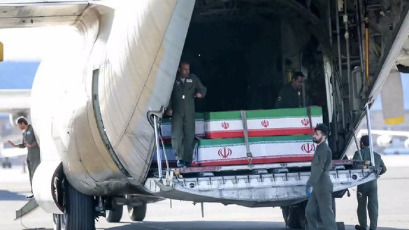 The bodies of Konarak accident victims arrive at an Iranian airport by military plane on May 12. [Iranian Ministry of Defence]