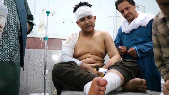 A wounded man is seen in Herat Regional Hospital July 31 hours after he was injured in a bombing in Herat city. [Omar]