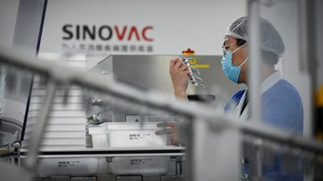 China attempts to repair reputation in last-ditch push for COVID-19 vaccine