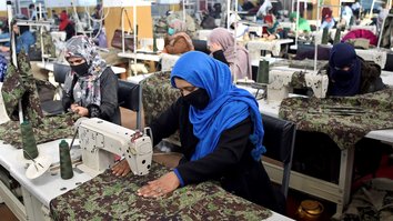 Afghan uniform factory offers lifeline to war widows