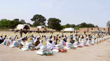 Afghan forces offer Ramadan assistance to families of fallen comrades