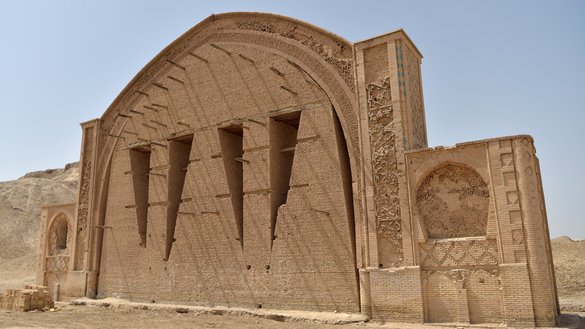 An arch of the historic fortress of Qala-e-Bost is seen in Bost on the outskirts of Lashkargah, Helmand province, on March 27. [Wakil Kohsar/AFP]