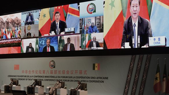 Chinese President Xi Jinping (on the screen) delivers his speech during the China-Africa Co-operation (FOCAC) meeting in Dakar, Senegal, last November 29. [Seyllou/AFP]