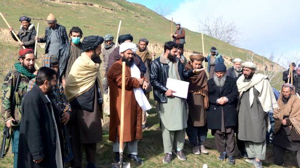A number of Kohi Khana village residents in Faryab province are seen in this photograph taken January 24 as they participate in a 'work for cash' project funded by the World Food Programme. [Faryab Agriculture and Livestock Department]