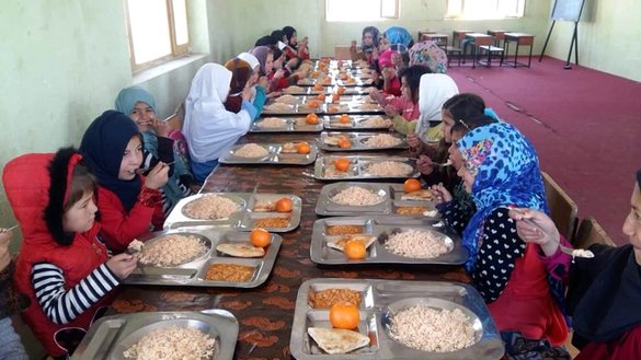 A number of children who have no legal guardians have lunch on July 8 at an orphanage supported by the Afghan Red Crescent Society (ARCS). [Courtesy of Hamidullah Sahel]