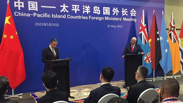 Chinese Foreign Minister Wang Yi and Fijian Prime Minister Frank Bainimarama attend a joint news conference in Fiji's capital, Suva, on May 30. During the conference, the leaders of 10 Pacific island nations rebuffed China's push to bring them into Beijing's orbit. [Leon Lord/AFP]