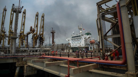 The Iranian-flagged oil tanker Fortune is docked at El Palito refinery after its arrival at Puerto Cabello, Venezuela, on May 25, 2020. [AFP]