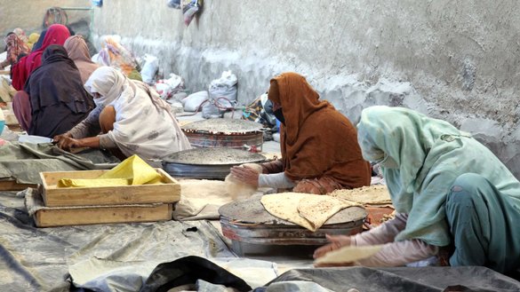 Women are seen January 16 at a bakery in Kandahar city as they bake local-style bread for a private company that distributes it to local stores. [Rahimullah Khpelwak/Salaam Times]