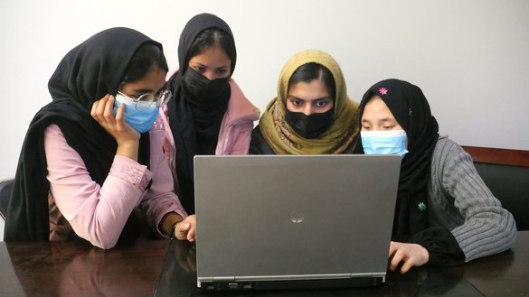 Girls attend online class from home in Herat city on February 8. [Omar/Salaam Times]
