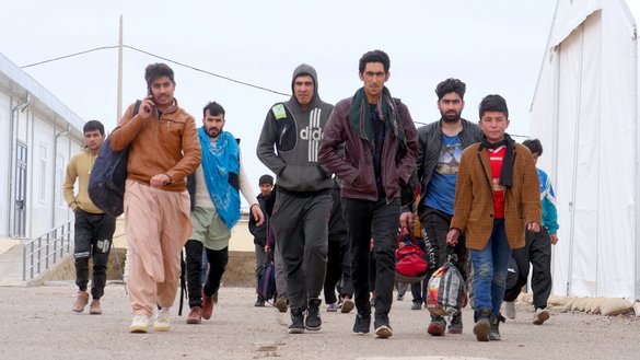 Afghans who were forcibly deported from Iran to Afghanistan are pictured at Islam Qala border crossing on February 12. [Omar/Salaam Times]