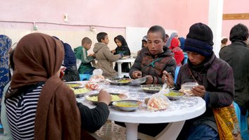 Afghan diaspora provides free lunch for hundreds of street children in Herat