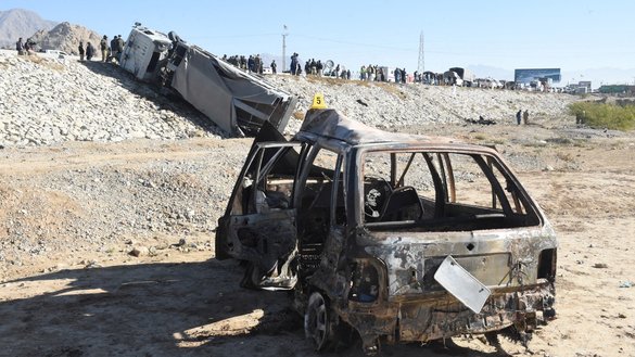 A burned-out vehicle is seen at the site of a suicide attack that targeted a police truck in the Pakistani city of Quetta last November 30. Three people were killed and 23 injured in the attack, claimed by the Tehreek-e-Taliban Pakistan (TTP). [Banaras Khan/AFP]