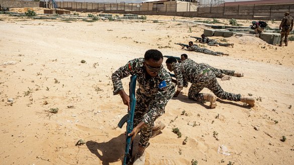 Somali soldiers take part in a military drill at the General Dhagabadan Training Centre in Mogadishu, March 19, 2024. [Amaury Falt-Brown/AFP]