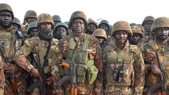 Malian armed forces pose for a photo on July 13 in Diafarebé village, Mopti Region. [Mali's Armed Forces]