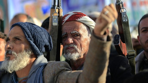 Supporters of Yemen's Houthis hold their weapons during a rally in the Houthi-held capital, Sanaa, on November 2, 2025. [Mohammed Huwais/AFP]