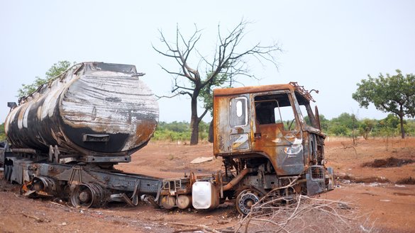 A fuel truck burned by the al-Qaeda-affiliated group JNIM on a road leading to Sikasso on May 26, 2026. [AFP]